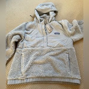 Brand new womens patagonia pull over size medium with tags never worn